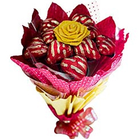 Delicious 12 Pcs Heart Shaped Chocolates Bouquet