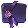 Mouth-Watering Chocolate Delights in a Purple Box