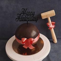 Ambrosial Round Chocolate Piata Cake with Hammer