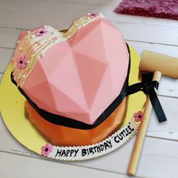 Marvelous Pink Heart Shape Piata Cake with Hammer