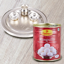 Luscious 1 Kg. Haldiram's Rasgulla and 5-6 inch Silver Plated Puja Thali