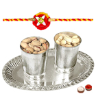 Delicious Selection of Dry Fruits in Silver Plated Glass and Tray Gift Set with 2 free Rakhi, Roli Tilak and Chawal