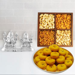 Delightful Silver Plated Ganesh Lakshmi with Dry Fruits and Sweets