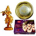 Intricate Krishna made of Sandalwood and Sweets Hamper