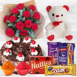 Awesome bouquet of Roses with a delicious Cake, mixed Cadburys Chocolate and lovely Teddy Bear