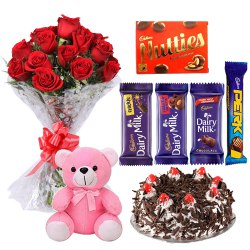 12 Exclusive Dutch Red Roses Bouquet with Cake, Assorted Cadburys Chocolate and a Cute Teddy Bear