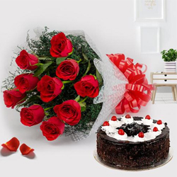 Elegant Black Forest Cake Glazed in Cream and Cluster of Red Roses