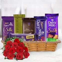 Shop for Gift Basket of Cadbury Chocolates with Red Roses Bunch