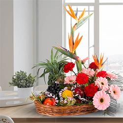 Seasonal Basket of Flowers with Bountiful 5 Kg. Fruits