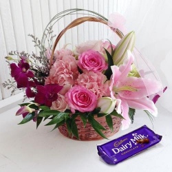 Beautiful Flower Arrangement with a Cadburys Chocolate Box with Love
