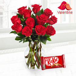 Exclusive Dutch Red Roses in Vase with free Cadburys Chocolate