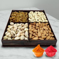 Nice Wrapped Gift Box containing Mixed Dry Fruits i.e. Raisin, Pistas, Cashews, Almonds, Wallnuts with free Gulal/Abir Pouch.