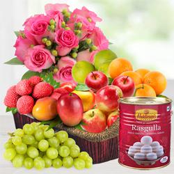 Succulent Fresh Fruits Basket with Tasty Haldiram Rasgulla and Pink Rose Bouquet