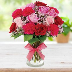 Sweet Graceful Bunch of Mixed Flowers in a Glass Vase