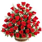 Joyful Presentation of Red Roses in a Lovely Basket