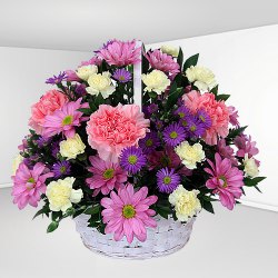 Seasonal Arrangement of Carnation Flowers in a Basket