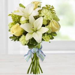 Titillating Bouquet of Lily, Roses & Carnations in Yellow Colour