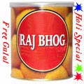 Nicely Gift Wrapped Raj Bhog 1 Kg from Haldiram with free Gulal/Abir Pouch.