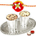 Delicious Selection of Dry Fruits in Silver Plated Glass and Tray Gift Set with 2 free Rakhi, Roli Tilak and Chawal