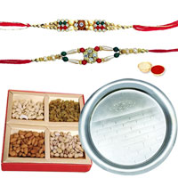 Flattering Gift Set of Pooja Thali N Assorted Dry Fruits with 2 free Rakhi, Roli Tilak and Chawal for your Precious Brother on the Occasion of Rakhi