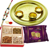 Dazzling Display of Decorative Silver Plated Thali, Soan Papdi and Mixed Dry Fruits along with Free Rakhi, Roli Tilak and Chawal for your Beloved Brother