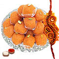 Breathtaking Arrangement of Free Decorative Rakhi, Roli Tilak and Chawal with <font color=#FF0000>Haldiram</font> Pure Ghee Ladoo for this Rakhi Festival