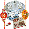 Amazing Rakhi Special Gift of Silver Plated Thali, <font color=#FF0000>Haldiram</font> Kaju Katli N Dry Fruits Platter with 2 Free Rakhi, Roli Tilak and Chawal for your Dear Brother
