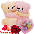 Cute Hugging Couple Teddy with 1 Velvet Rose and 3 pcs Heart Homemade Chocolate