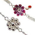 Remarkable Raksha Bandhan Gift of Silver Plated Twin Rakhi Set with free Roli Tilak and Chawal
