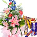 Seasonal Flowers Arrangement with Assorted Cadburys Chocolate
