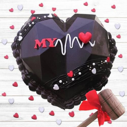 Mouth Watering Heart Beat Piñata Cake with Hammer