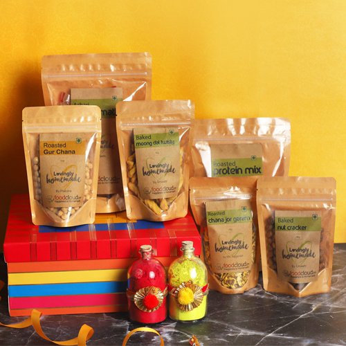 Tasty Assorted Treats N Organic Gulal Gift Hamper