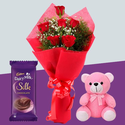 Delightful Red Roses Bouquet with Teddy N Cadbury Dairy Milk Silk