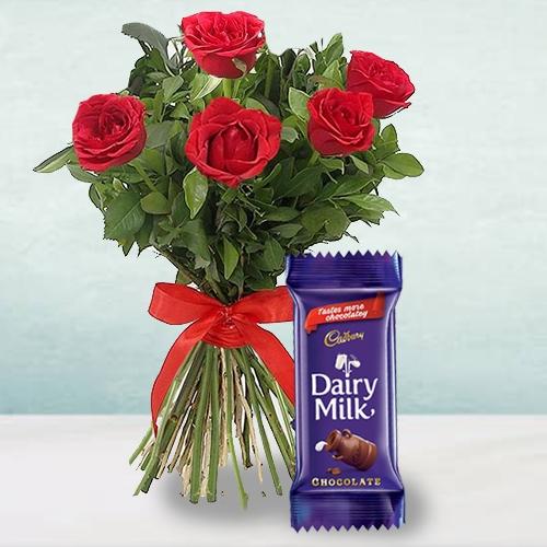 Attractive 5 Red Roses Bunch with a Cadbury Chocolate Bar