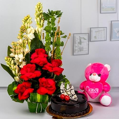 Luxurious Combo of Fresh Flowers with Small Teddy, Chocolate Cake n Cadbury Celebration Pack