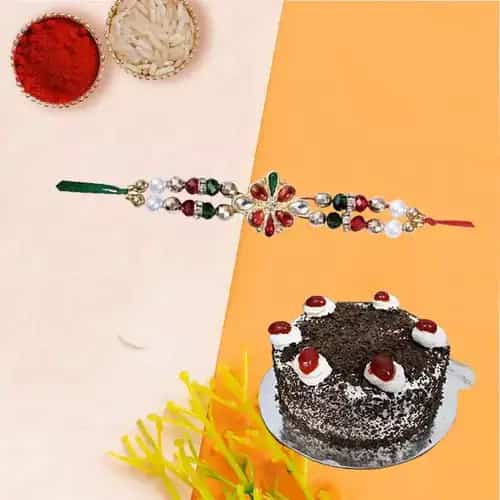Mouth Watering Black Forest Cake along with Rakhi and Free Roli Tika N Chawal for your Caring Brother