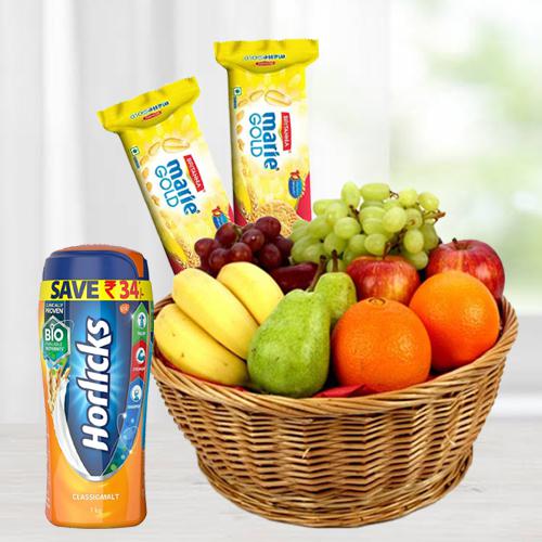 Delicious Fruits Basket with Horlicks and Biscuits