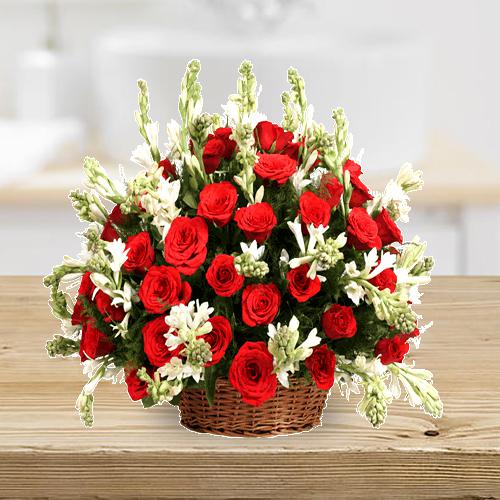 Precious Basket Arrangement of Red Roses n Tube Roses
