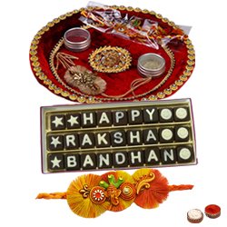 Impressive Display of Decorative Rakhi Thali and Homemade Raksha Bandhan Chocolate Pack with Free Rakhi Roli Tilak N Chawal for your Beloved Brother<br>